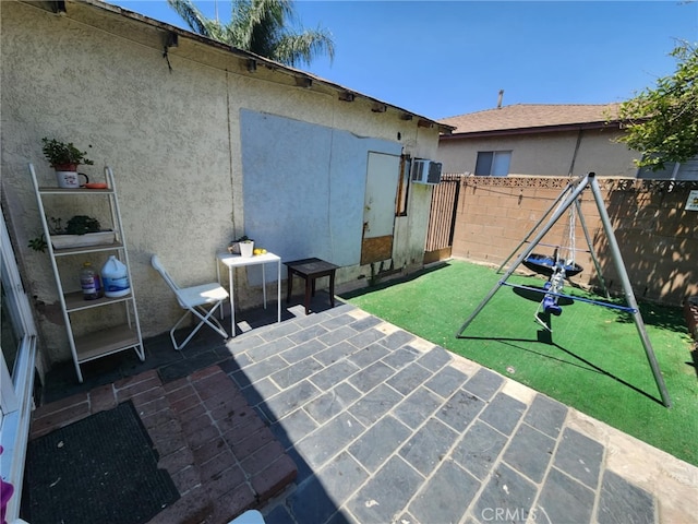 8626 Laurel Canyon Blvd, Sun Valley, CA 91352 - fenced backyard featuring a patio and a playground