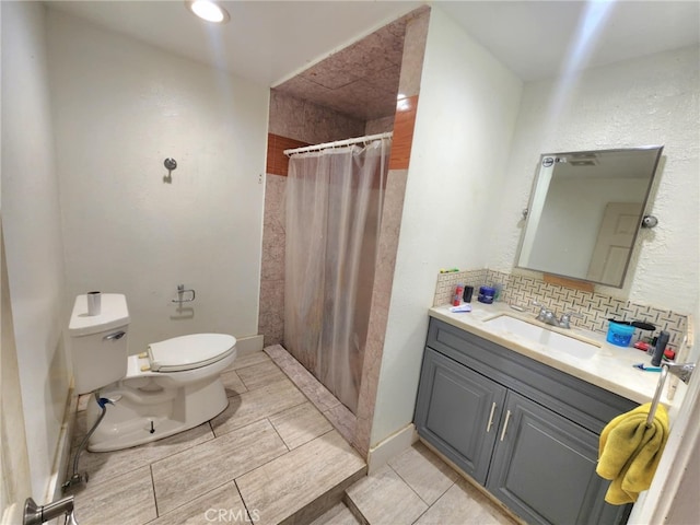 8626 Laurel Canyon Blvd, Sun Valley, CA 91352 - bathroom with vanity, a tile shower, and tasteful backsplash