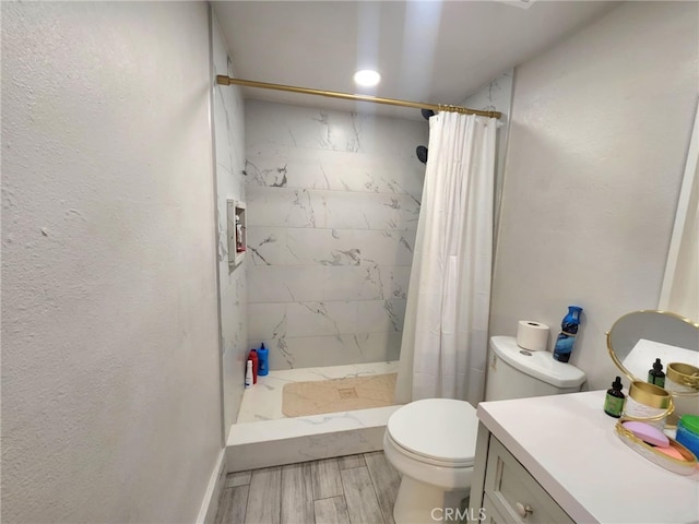 8626 Laurel Canyon Blvd, Sun Valley, CA 91352 - full bath featuring vanity, a stall shower, and wood finished floors