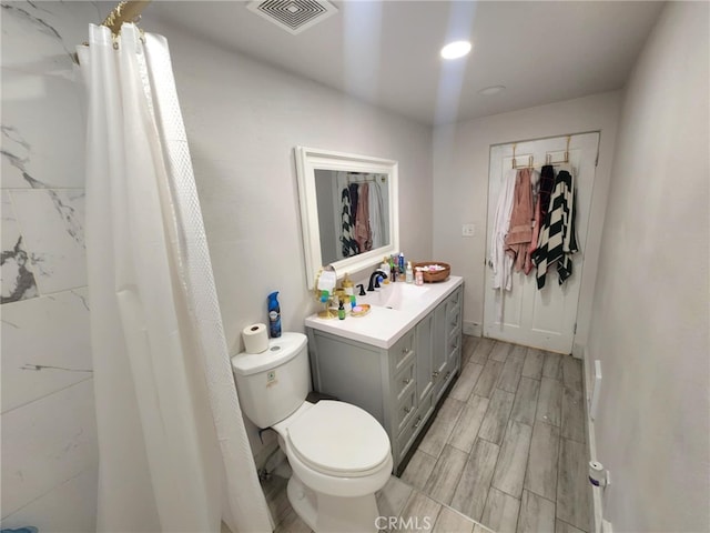 8626 Laurel Canyon Blvd, Sun Valley, CA 91352 - bathroom featuring vanity, wood finished floors, and a shower with curtain