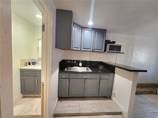 8626 Laurel Canyon Blvd, Sun Valley, CA 91352 - bar featuring stainless steel microwave and recessed lighting