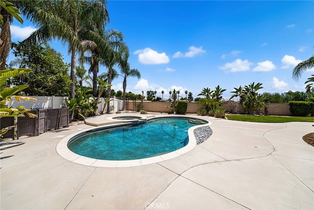 1909 Crystal Cove Ct, Redlands, CA 92374 - view of pool featuring a fenced backyard, a patio area, and a pool with connected hot tub