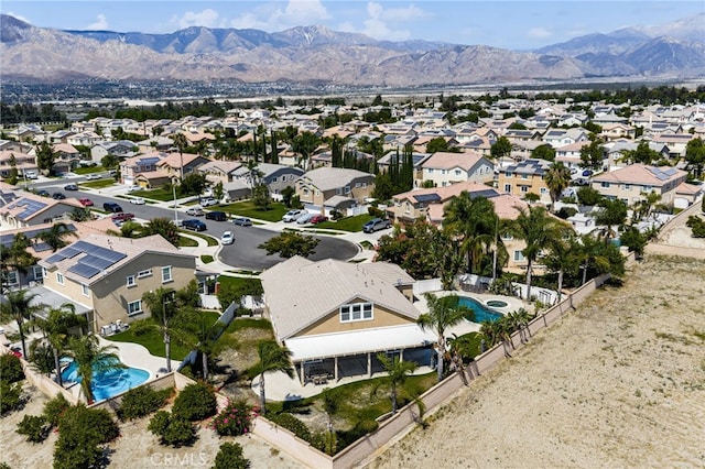1909 Crystal Cove Ct, Redlands, CA 92374 - aerial perspective of suburban area with a pool area and a mountain backdrop