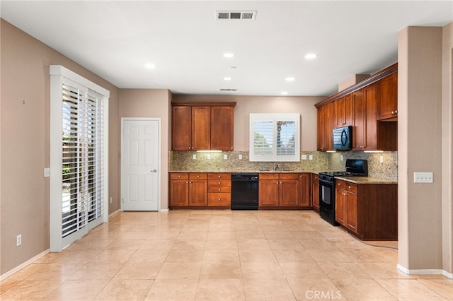 1909 Crystal Cove Ct, Redlands, CA 92374 - kitchen featuring black appliances, tasteful backsplash, light stone counters, brown cabinets, and recessed lighting