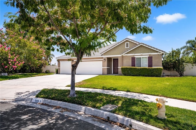 1909 Crystal Cove Ct, Redlands, CA 92374 - view of front of home with stucco siding, concrete driveway, and a garage