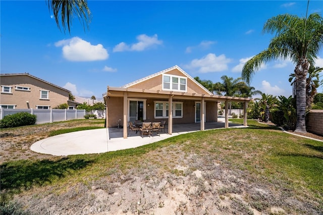 1909 Crystal Cove Ct, Redlands, CA 92374 - rear view of house featuring stucco siding and a patio area