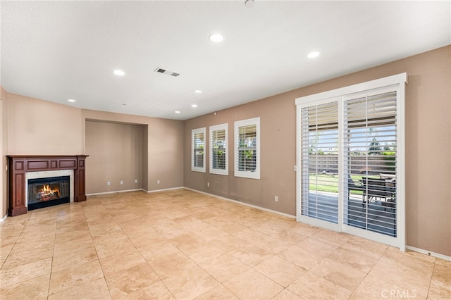 1909 Crystal Cove Ct, Redlands, CA 92374 - unfurnished living room featuring healthy amount of natural light, recessed lighting, a premium fireplace, and light tile patterned floors