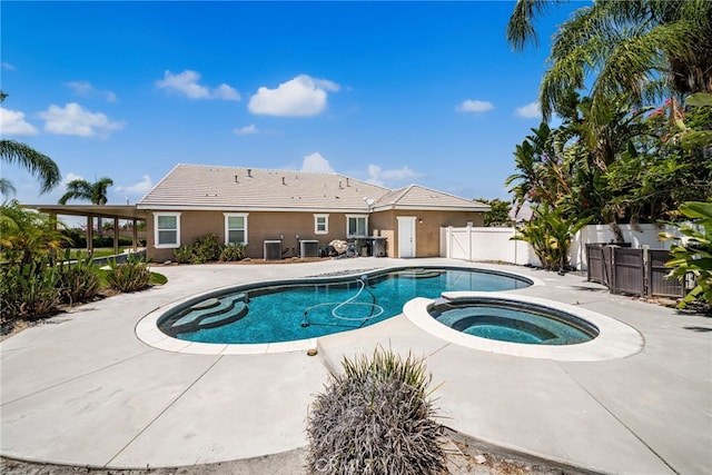 1909 Crystal Cove Ct, Redlands, CA 92374 - view of swimming pool with a patio area and a pool with connected hot tub