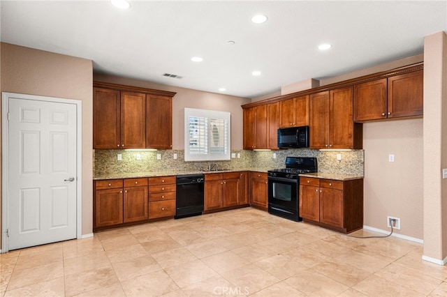 1909 Crystal Cove Ct, Redlands, CA 92374 - kitchen with black appliances, brown cabinets, light stone countertops, decorative backsplash, and recessed lighting