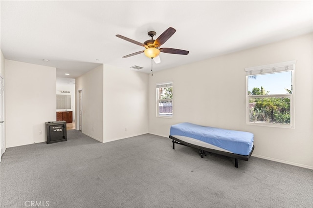 1909 Crystal Cove Ct, Redlands, CA 92374 - carpeted bedroom featuring ceiling fan and ensuite bath