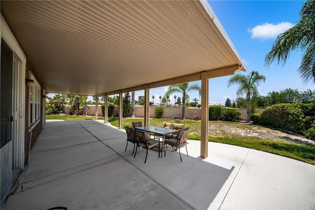 1909 Crystal Cove Ct, Redlands, CA 92374 - fenced backyard featuring outdoor dining space and a patio