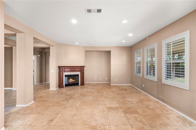 1909 Crystal Cove Ct, Redlands, CA 92374 - unfurnished living room with recessed lighting and a glass covered fireplace
