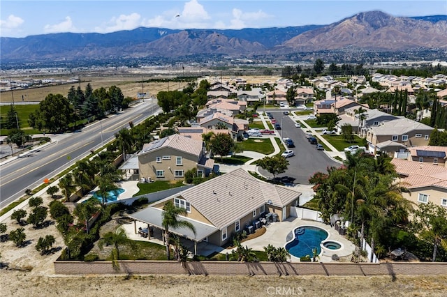 1909 Crystal Cove Ct, Redlands, CA 92374 - aerial perspective of suburban area featuring a mountain backdrop and a pool