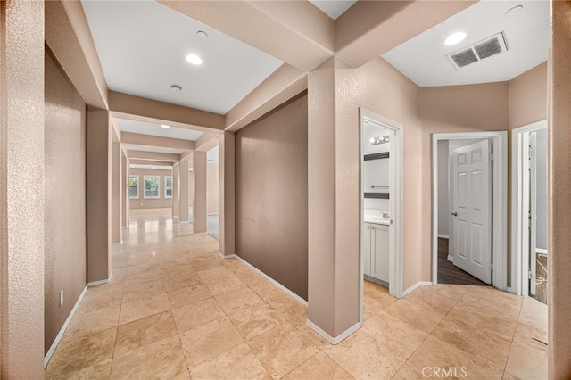 1909 Crystal Cove Ct, Redlands, CA 92374 - corridor featuring a textured wall and recessed lighting