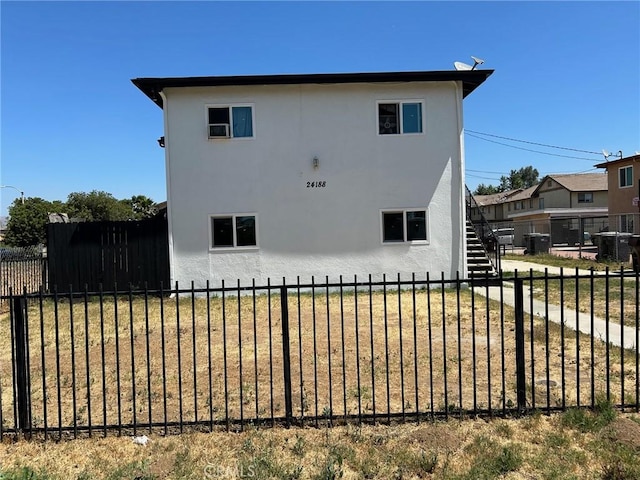 24188 Clover Ave, Moreno Valley, CA 92551 - back of property featuring stucco siding and stairs