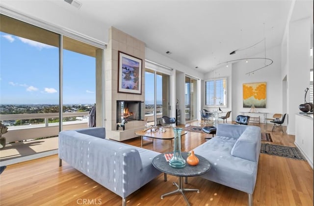 425 Via El Chico, Redondo Beach, CA 90277 - living area featuring healthy amount of natural light, hardwood / wood-style floors, and a fireplace