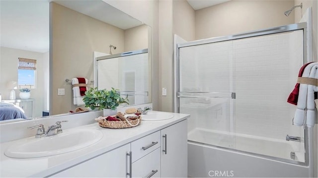 7599 Taylor Ave, Hesperia, CA 92345 - ensuite bathroom featuring enclosed tub / shower combo and double vanity