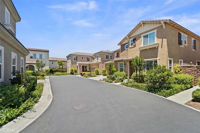 7524 Cessna St, Chino, CA 91708 - view of asphalt road with a residential view