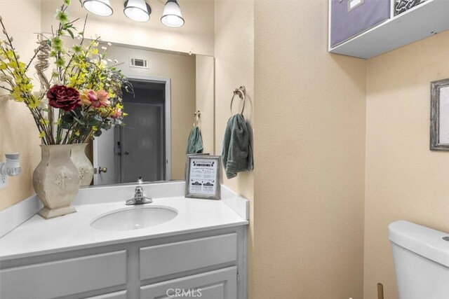 32110 Camino Herencia, Temecula, CA 92592 - half bathroom featuring vanity and toilet
