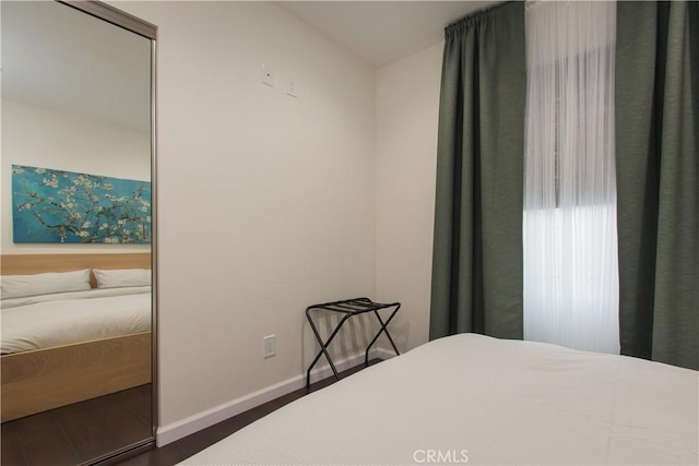 239 W Hillcrest Blvd, Inglewood, CA 90301 - bedroom featuring wood finished floors and baseboards