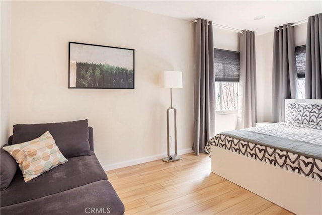 239 W Hillcrest Blvd, Inglewood, CA 90301 - bedroom featuring light wood-style flooring and baseboards