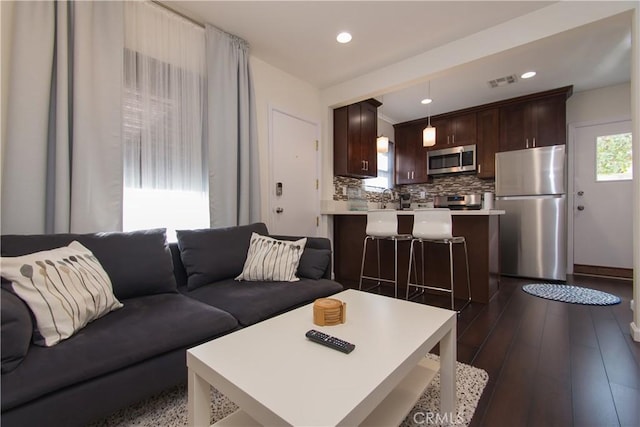 239 W Hillcrest Blvd, Inglewood, CA 90301 - living area featuring dark wood-type flooring and recessed lighting