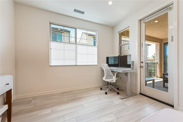 304 Floral Vw, Irvine, CA 92618 - office with healthy amount of natural light, wood finished floors, and recessed lighting
