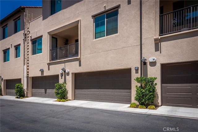 304 Floral Vw, Irvine, CA 92618 - view of property with a garage
