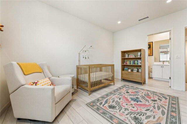 304 Floral Vw, Irvine, CA 92618 - bedroom featuring recessed lighting, connected bathroom, and light wood finished floors
