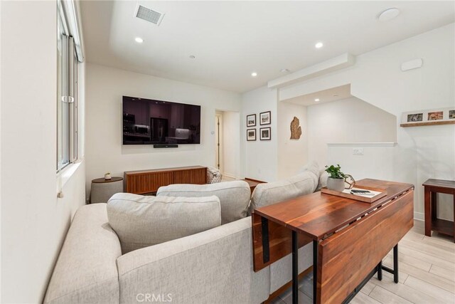 304 Floral Vw, Irvine, CA 92618 - living room with recessed lighting and light wood-style floors