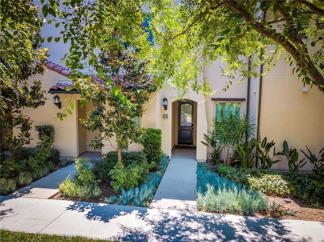 304 Floral Vw, Irvine, CA 92618 - property entrance with stucco siding
