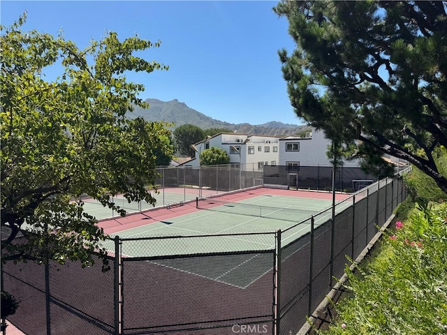 1688 Palisades Dr, Pacific Palisades, CA 90272 - view of tennis court with a mountain view