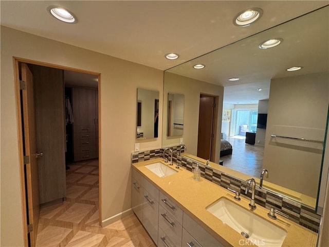 1688 Palisades Dr, Pacific Palisades, CA 90272 - ensuite bathroom featuring double vanity and recessed lighting