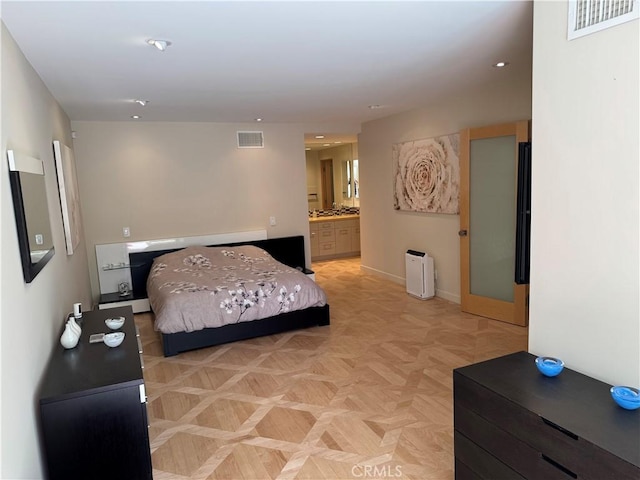 1688 Palisades Dr, Pacific Palisades, CA 90272 - bedroom featuring connected bathroom and recessed lighting