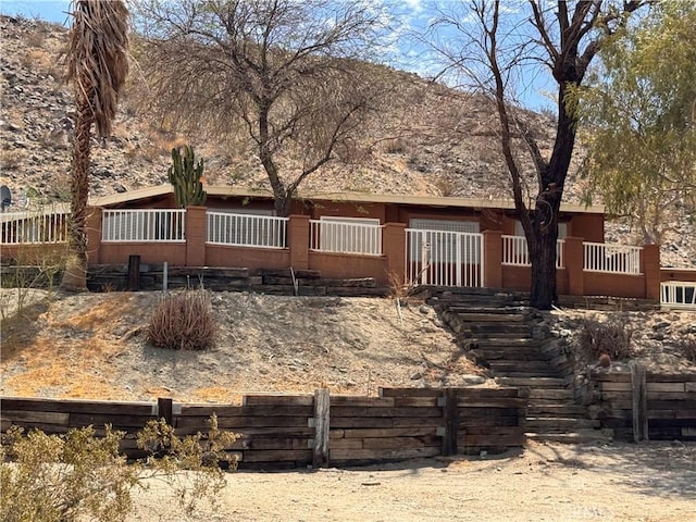 73455 Helms Rd, Desert Hot Springs, CA 92241 - view of front of home with a mountain view