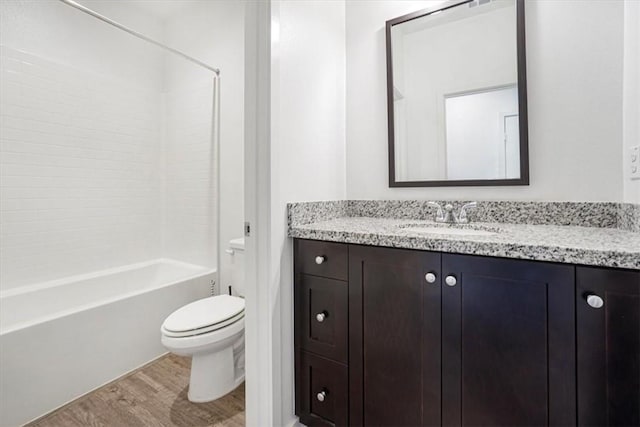 1246 Venice Ave, Mentone, CA 92359 - bathroom featuring wood finished floors, vanity, and bathing tub / shower combination