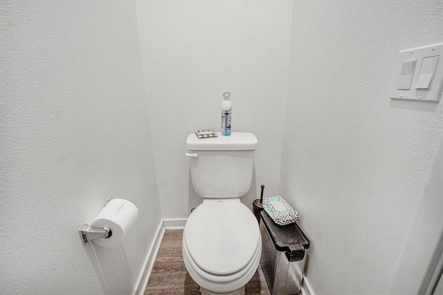 1246 Venice Ave, Mentone, CA 92359 - bathroom featuring toilet and wood finished floors
