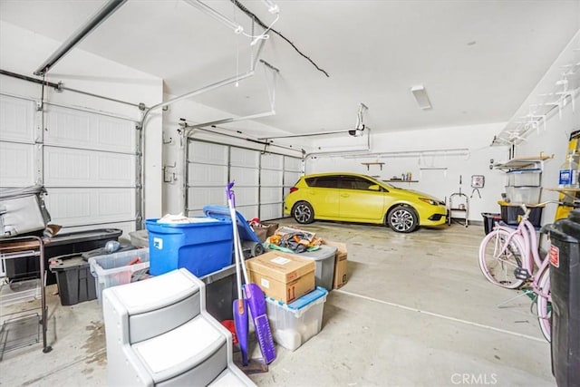 1246 Venice Ave, Mentone, CA 92359 - garage featuring a garage door opener