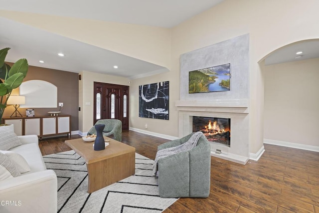 4961 Alcove Ave, Valley Village, CA 91607 - living area featuring wood finished floors, recessed lighting, a fireplace, and arched walkways