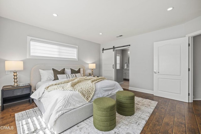 4961 Alcove Ave, Valley Village, CA 91607 - bedroom with a barn door, wood-type flooring, and recessed lighting