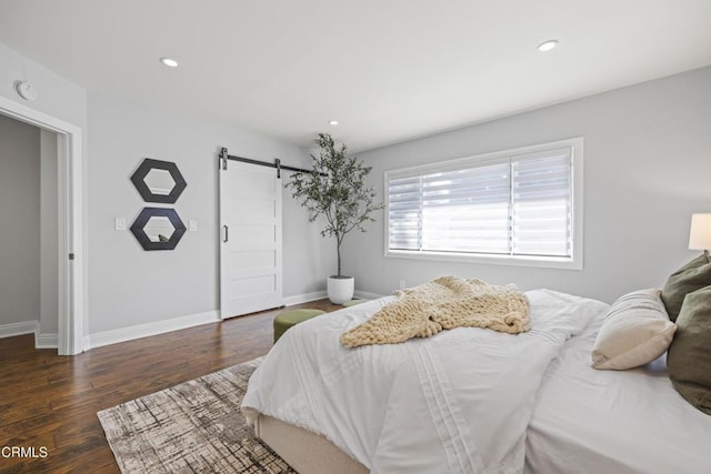 4961 Alcove Ave, Valley Village, CA 91607 - bedroom with a barn door, wood finished floors, and recessed lighting
