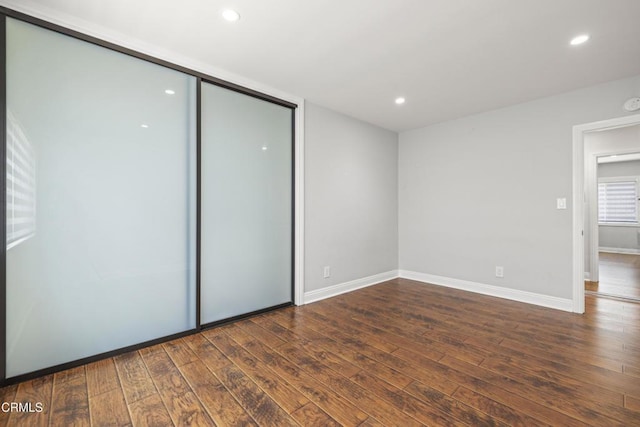 4961 Alcove Ave, Valley Village, CA 91607 - unfurnished bedroom featuring dark wood-type flooring, a closet, and recessed lighting