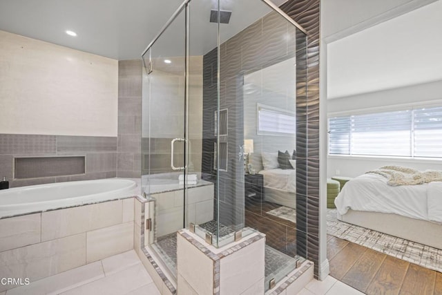 4961 Alcove Ave, Valley Village, CA 91607 - bathroom featuring a garden tub, a shower stall, ensuite bathroom, tile patterned floors, and recessed lighting