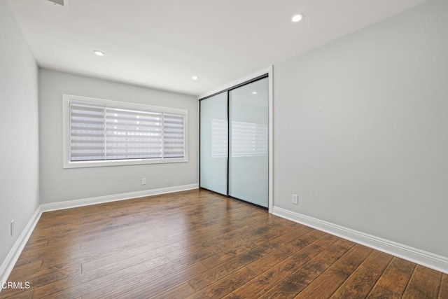 4961 Alcove Ave, Valley Village, CA 91607 - unfurnished bedroom with hardwood / wood-style floors, a closet, and recessed lighting