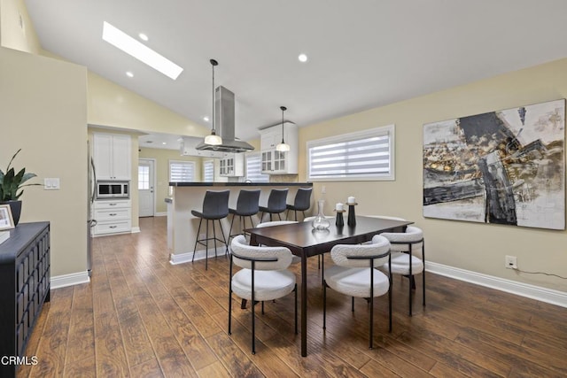 4961 Alcove Ave, Valley Village, CA 91607 - dining room with dark wood-style floors, a skylight, lofted ceiling, and recessed lighting
