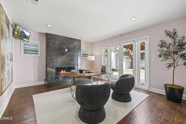 4961 Alcove Ave, Valley Village, CA 91607 - living area featuring a premium fireplace, wood finished floors, and recessed lighting