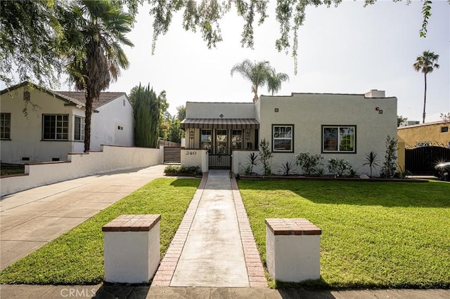 240 Rosemont Blvd, San Gabriel, CA 91775 - mediterranean / spanish house with a gate and stucco siding