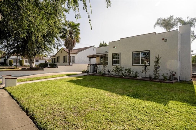 240 Rosemont Blvd, San Gabriel, CA 91775 - view of front facade featuring a front yard and stucco siding