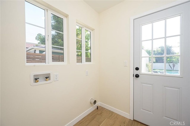 240 Rosemont Blvd, San Gabriel, CA 91775 - washroom with hookup for a washing machine and light wood-style flooring