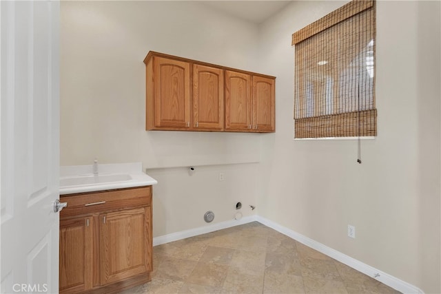 19570 Vermillion Ln, Apple Valley, CA 92308 - laundry area with gas dryer hookup, cabinet space, and washer hookup